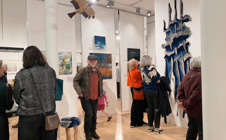 People in Gallery 2 seeing the 'Decade' exhibition