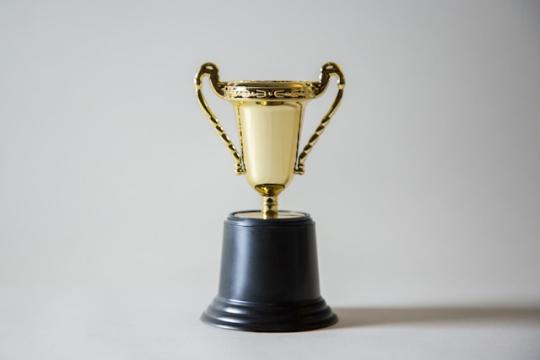 Yellow and white trophy